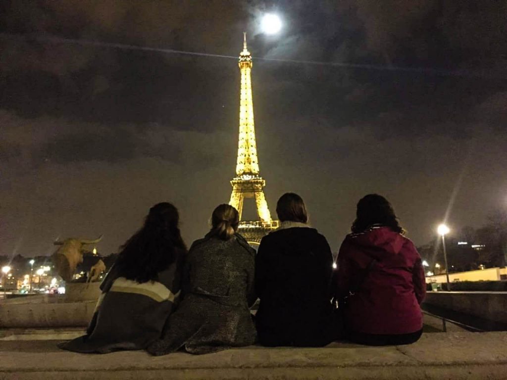 Girls Eiffel Tower at night Paris France