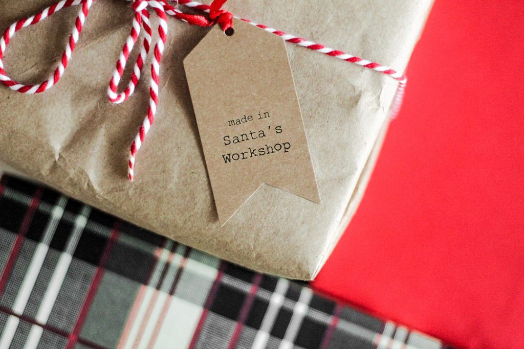 a wrapped gift box - travel gifts for her