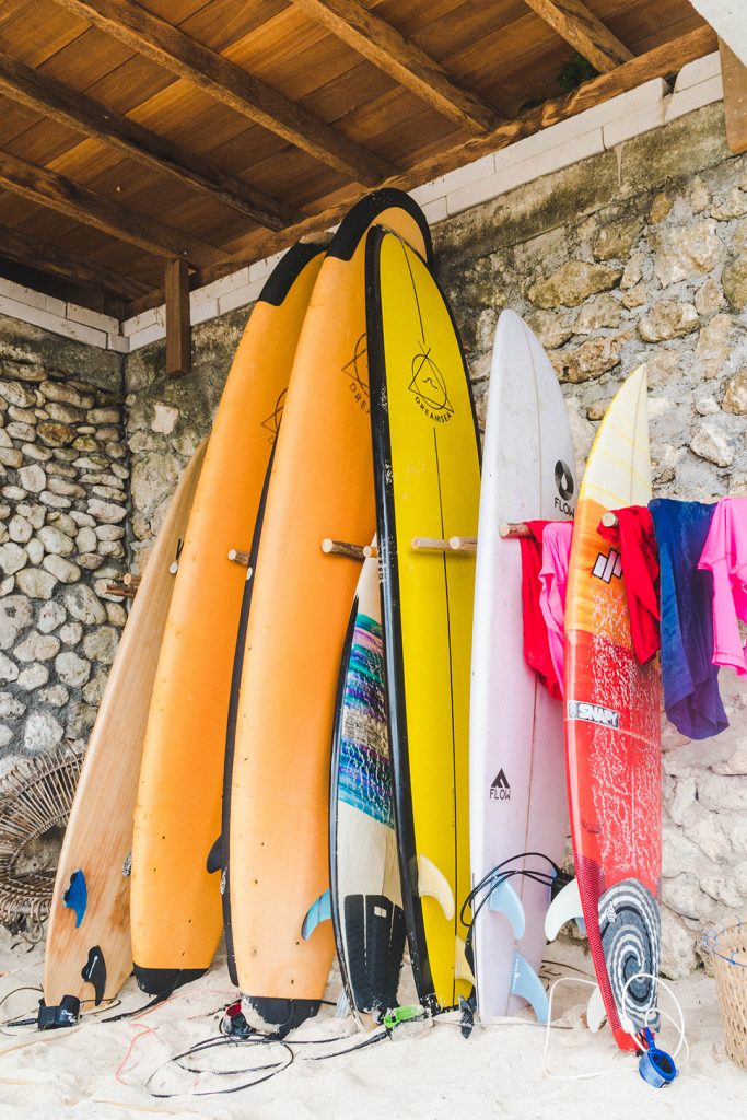 Surf boards lined up for bali surf camp