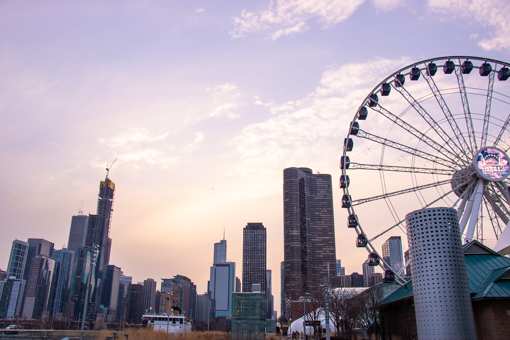 a ferris wheel and skyscrapers in chicago