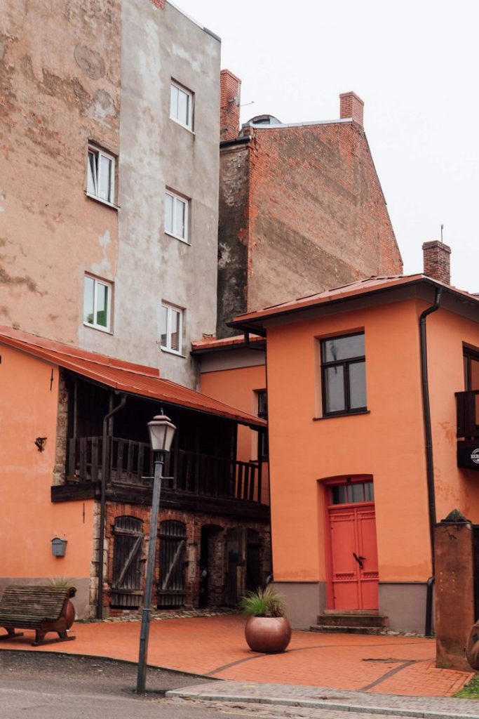 a tilting orange house in cesis old town