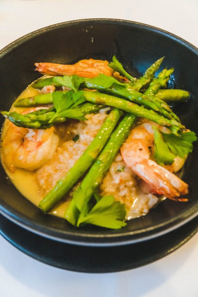 lobster risotto with asparagus on top