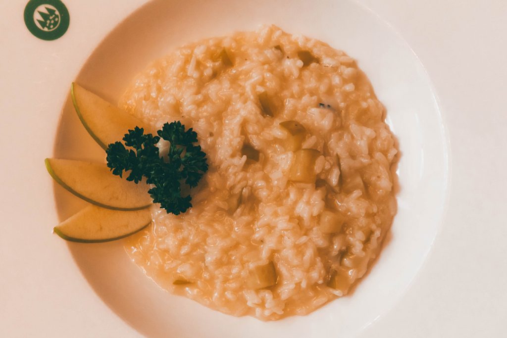 Risotto with local apples, which you must eat when you visit Trentino!