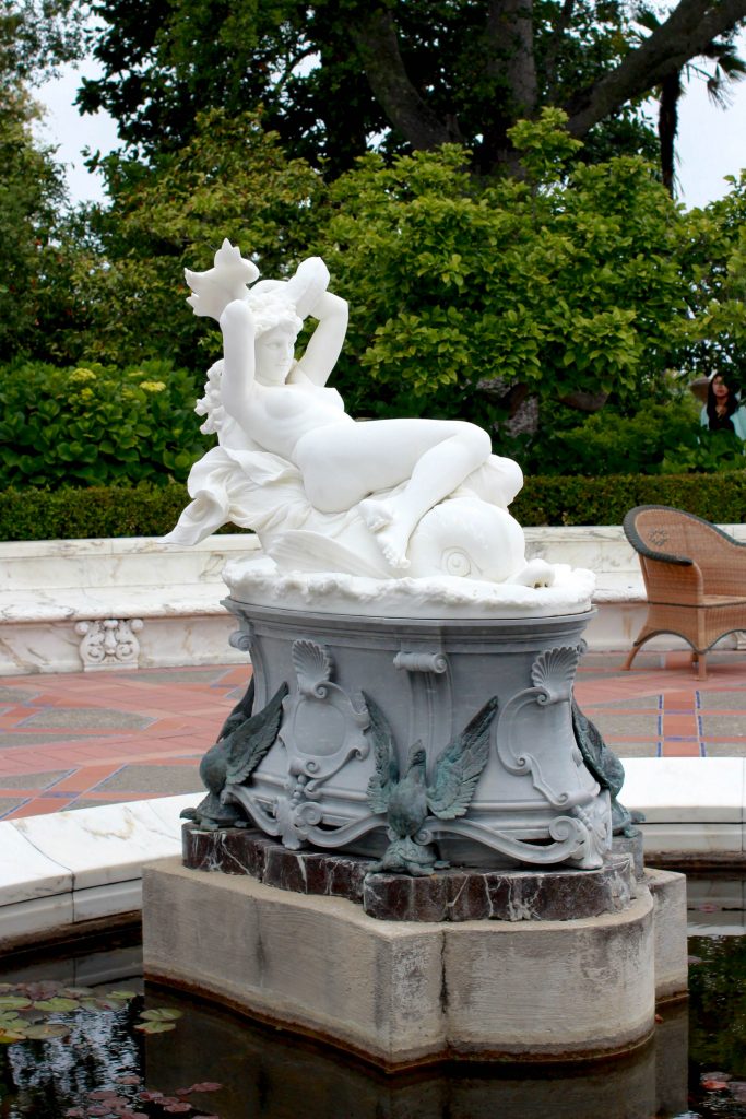 a statue of a reclining woman
