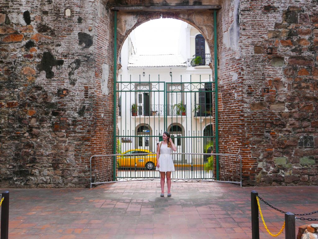 Addie in front of the Arco Chato in Casco Viejo, Panama City