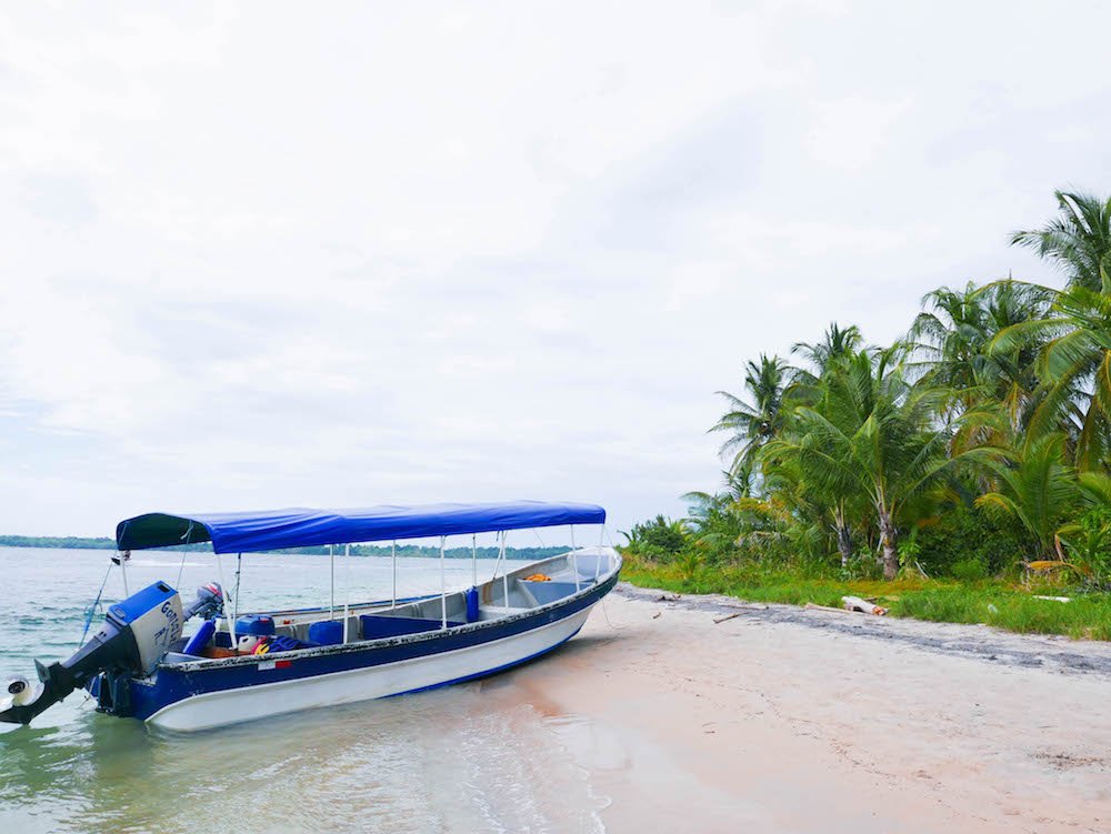 Boat on the each on Isla Colon, Bocas del Toro, Panama