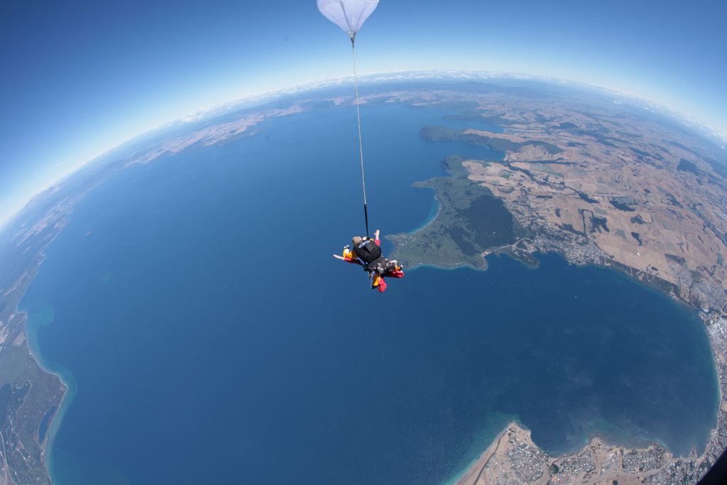 Girl skydiving in New Zealand
