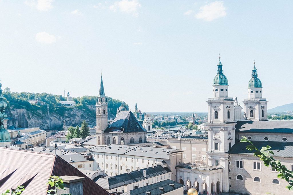 View of a church from a random viewpoint on the walk up to the Salzburg Fortress