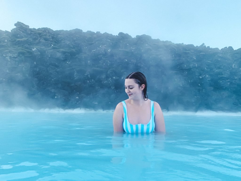 Addie in the Blue Lagoon, a highlight of 5 days in Iceland, and a great solo female travel destination