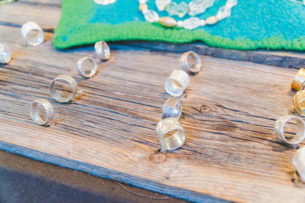 silver rings stood on their side in 3 rows at one of the Regensburg Christmas markets