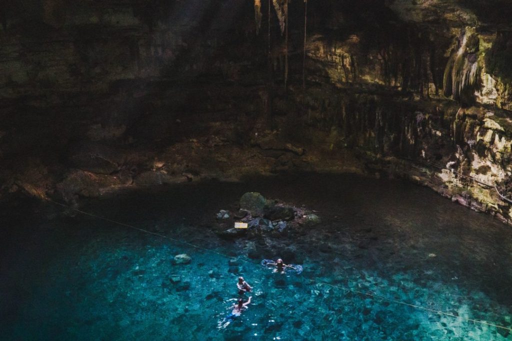 Blue water in one of the Valladolid Cenotes, or cave lakes