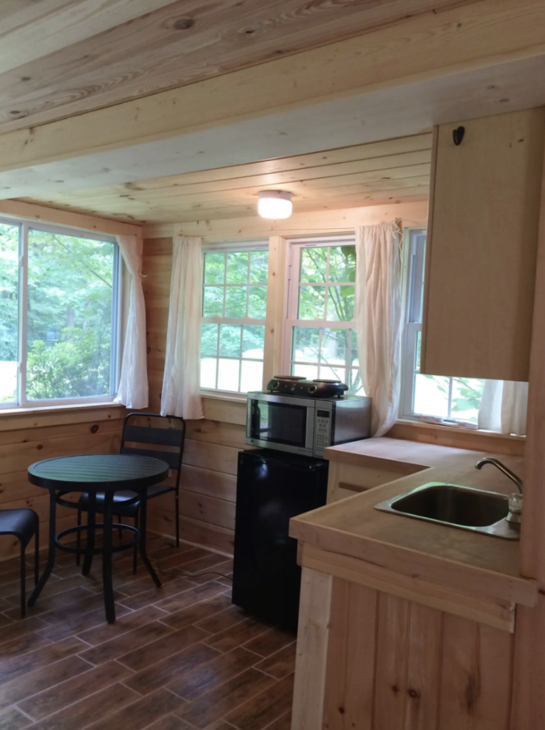 a small, wood-plank kitchen