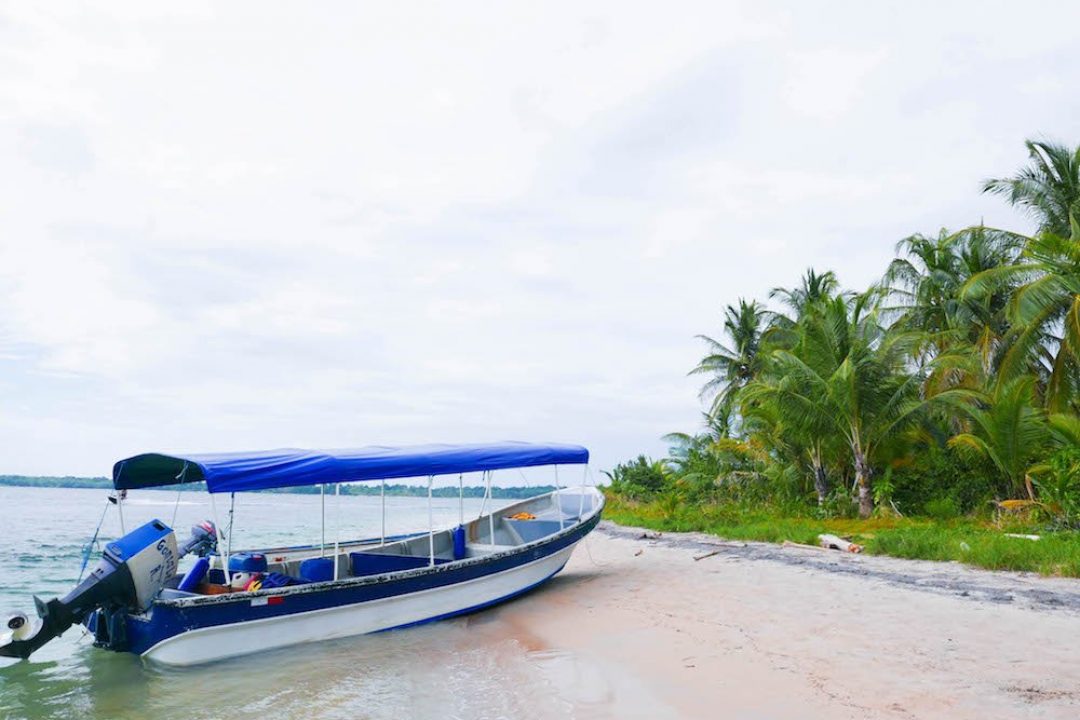 Boat on the each on Isla Colon, Bocas del Toro, Panama